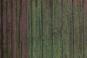 Fototapeta premium Background of old vintage wood. Textural background.Texture of green-brown color.Empty background.Space for inscriptions or objects.