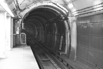 train tunnel in black and white