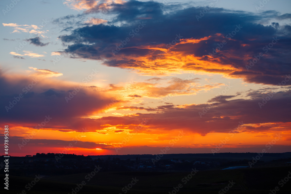 Sticker Fantastic colorful sunrise with cloudy sky.