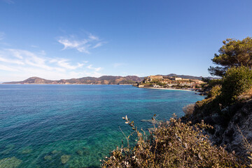 Fototapeta na wymiar View to famous Le Ghiaie beach, a little free beach near Forte Falcone Portoferraio, Island of Elba, Italy