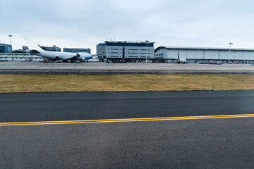 Fototapeta na wymiar Empty cement floor in runway airport