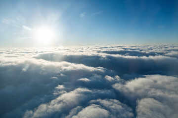 Naklejka premium Fluffy white clouds from above