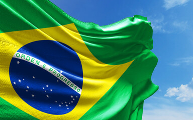 Brazilian Flag is Waving Against Blue Sky with Clouds