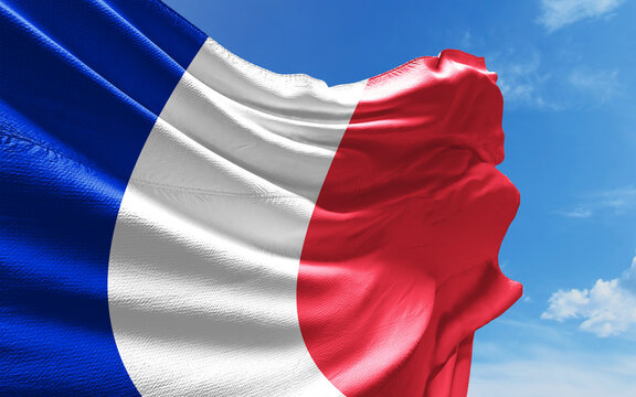 French Flag is Waving Against Blue Sky with Clouds