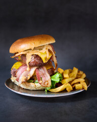 hamburger with french fries on chalkboard background