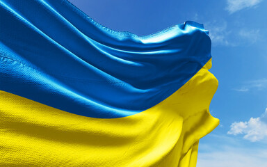Fototapeta na wymiar Ukrainian Flag is Waving Against Blue Sky with Clouds