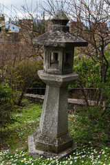 Japanese concrete lantern in park 