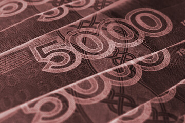 Russian banknotes 5000 rubles close-up. Fragment of a note with a focus on the denomination figure....