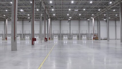 interior of a empty light warehouse - Powered by Adobe