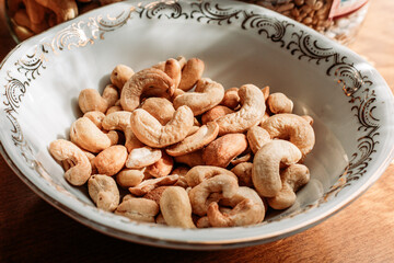 Top view of salted cashew nuts. Healthy snacks