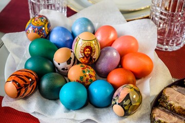 Painted eggs for the Easter holiday on the Easter table.