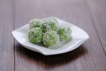Malay traditional delicacy, in Malaysia called buah melaka. be of glutinous rice and filled with palm sugar or brown sugar.
