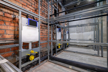 modern bathroom renovation. loft building. the toilet is being repaired.