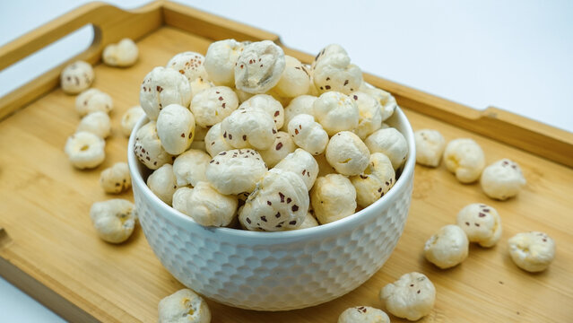 Flavored Prickly Water Lily. Dried makhana also known as water lily. Fox nut. Makhanas. Lotus seeds. The edible seeds, called fox nuts or makhana when dried, are eaten in Asia.