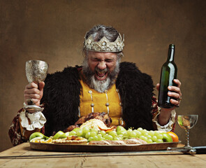 Im the life of the party. A mature king feasting alone in a banquet hall.