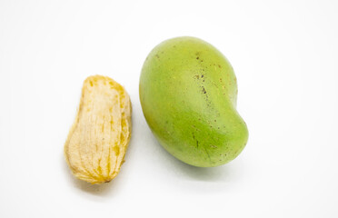 mango with mango seeds on white background