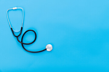 Close up of stethoscope on blue background