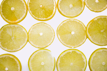 lemon slice design on white, top view,selective focus