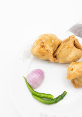 Singara vegetable stuffing isolated on white background