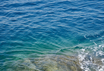 Crystal clear sea water on the Ligurian coast in Italy