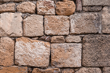Texture of a stone wall. Old castle stone wall texture background. Stone wall as a background or texture. Part of a stone wall, for background or texture