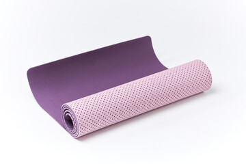Violet Yoga Mat With White Background. Violet Yoga Mat on a white background. Close up view at exercise Violet mat isolated on the white. 