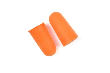 Two orange earplugs isolated on a white background.Close-up.Soft foam ear plug