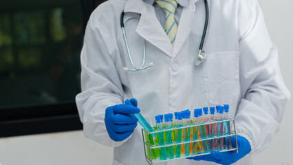 Laboratory scientists work with in vitro liquid test tubes for healthcare researchers, and medical science technology, to test vaccines. hospitalization