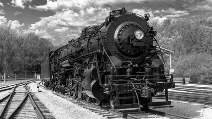 Black and white shot if old steam locomotive train engine 