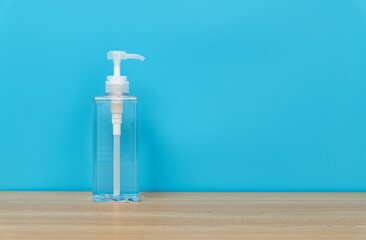 Hand sanitizer on wooden table