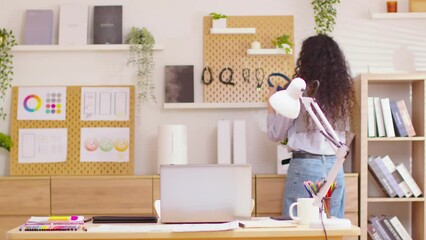 Timelapse Asian attractive woman working hard, listening to music, busy, multitasking at home office with well designed background working space.Timelapse time flies working hard lifestyle concept.