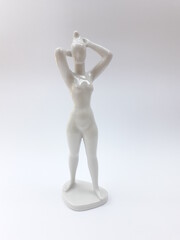Vintage porcelain nude woman figurine isolated