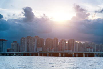 Naklejka premium Dark clouds over the seaside city