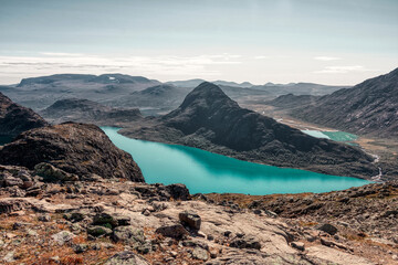 Famous Besseggen trail in Norway. Epic trekking and view toward Øvre Leirungen.