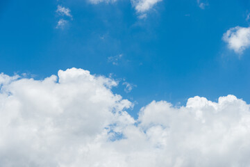 Naklejka na ściany i meble Large cloud on blue sky