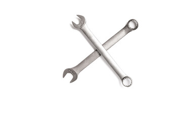 Pair of 2 Boxed and Open End Wrenches Cross Perpendicular on White Background

