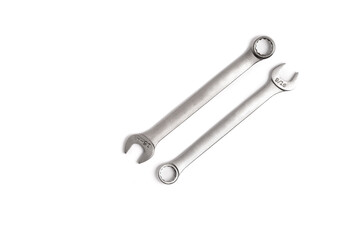 Two Boxed and Open End Wrenches Lay Parallel and Inverse on White Background
