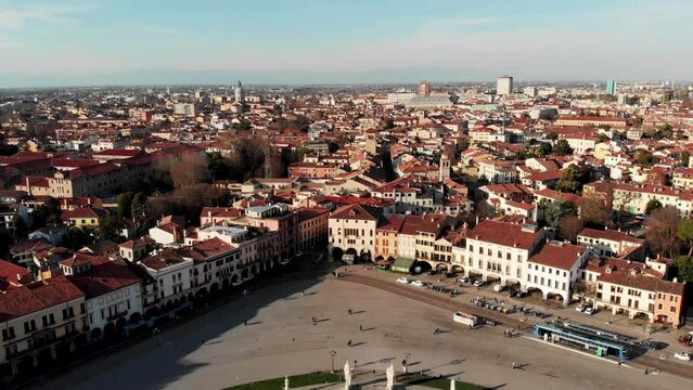 Aerial view of Padua in northern Italy. Drone view of Prato della Valle. A canal in the shape of an ellipse around the central part of the square. Bridges over the canal and a double row of statues