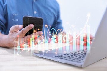 Stock market investments, funds, and digital assets. Businessman uses smartphones looking stock market investments traded graph financial for profit in the future. Trade stocks concept.