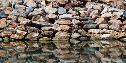 Rock wall protection from the waves - Seamless texture background