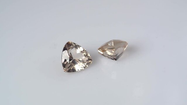 imperial champagne yellow topaz trillion cut in the turning tweezers