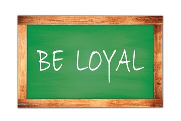 Fototapeta premium BE LOYAL text written on green school board.