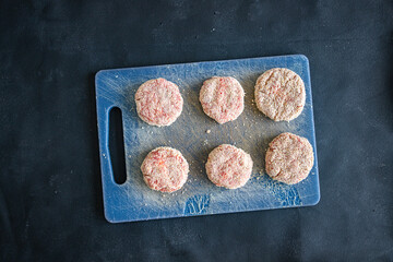 raw cutlet meat breadcrumbs pork, beef, lamb, chicken fresh cutlets healthy meal food snack diet on the table copy space food background rustic top view