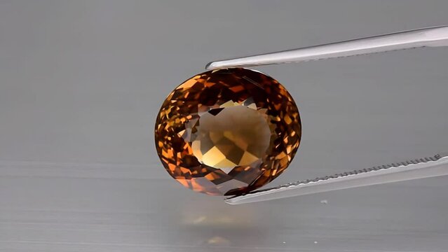 imperial champagne yellow topaz oval cut in the turning tweezers