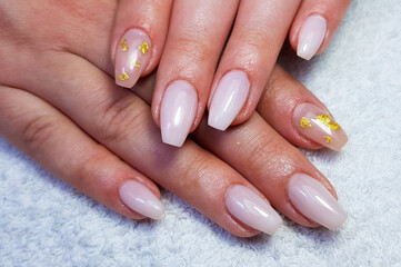 a close-up with gel-painted nails