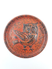 Mid-century modern orange wall plate with an owl, isolated