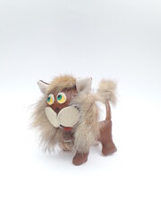 Old faux leather lion toy isolated