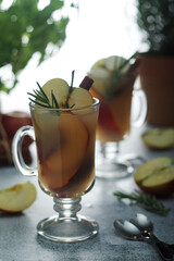 Warm apple autumn drink with cinnamon	