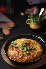 Traditional Spanish dish tortilla on the table	