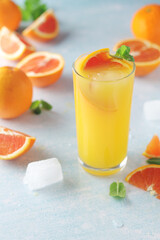 Red oranges juice with mint and ice